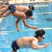 Người khuyết tật tham gia thi bơi lội
