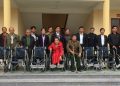Người khuyết tật được hỗ trợ xe lăn trong các chương trình an sinh xã hội (Ảnh minh họa)